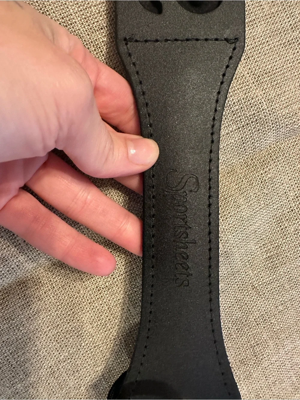 Black Leather Paddle with Embossed Lettering and Wrist Loop